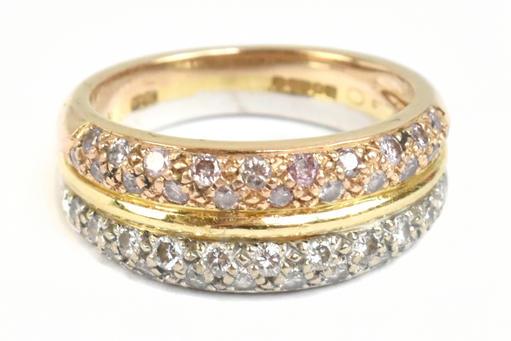 BOODLES; an 18ct yellow, rose and white gold ring set with two rows of natural pink and white