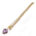 A 9ct yellow gold fine link chain supporting a heart shaped pale purple pendant, length of chain