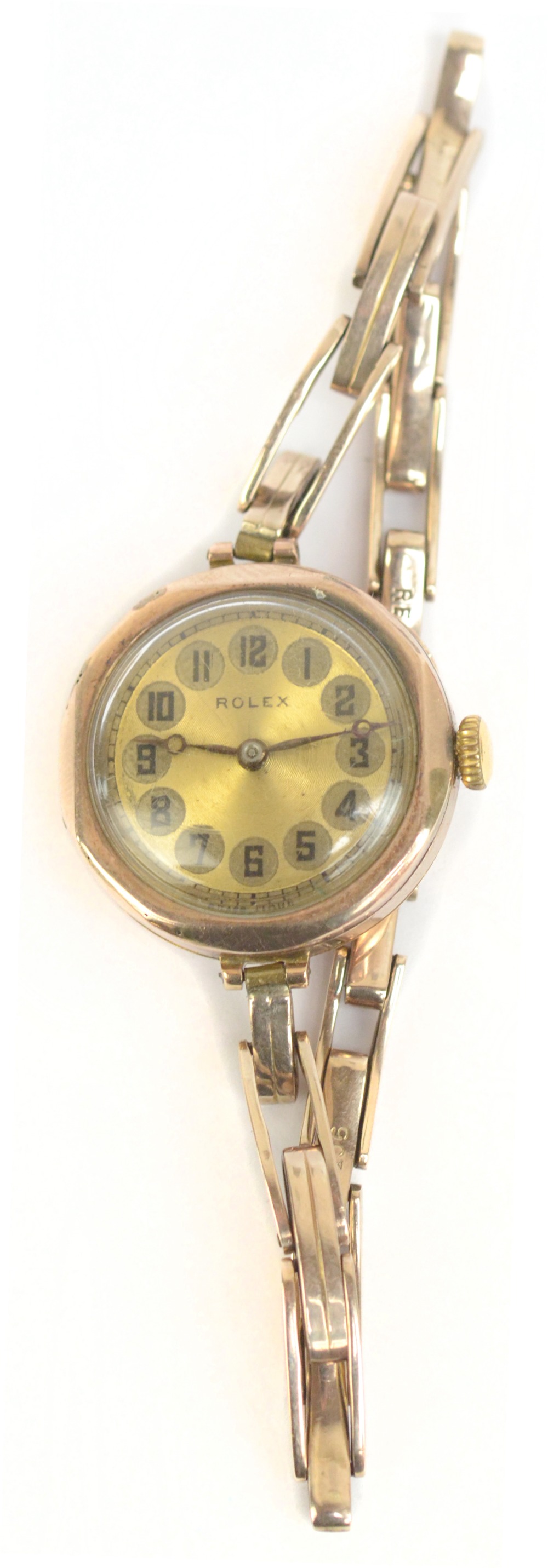 ROLEX; a lady's vintage 9ct yellow gold wristwatch, the circular enamel dial set with Arabic