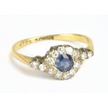 An 18ct yellow gold sapphire and diamond ring, size K, approx 2.2g.Additional InformationScratches