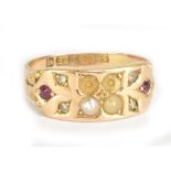 A 15ct yellow gold ruby, seed pearl and diamond dress ring, size K, approx 2.2g (af).Additional