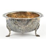 WILLIAM COMYNS & SONS; a Victorian hallmarked silver bowl of circular form, with repoussé decoration