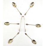 A J BAILEY; a cased set of six Edward VII hallmarked silver teaspoons with foliate finials,