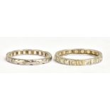 Two white metal full diamond eternity rings, the largest size Q, approx combined 5.4g.Additional