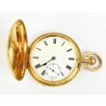 An Edwardian 18ct yellow gold crown wind full hunter pocket watch, the white enamel dial set with