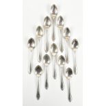 JAMES DIXON & SONS; a set of twelve George VI hallmarked silver teaspoons with cast decoration to