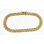 A 9ct yellow gold fancy link bracelet, length 19.5cm, approx 7.7g.