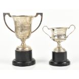 WILLIAM ADAMS LTD; a George VI hallmarked silver twin handled pedestal trophy cup with