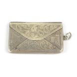 An Edwardian hallmarked silver stamp case in the form of an envelope, Chester 1908, approx 0.27ozt/