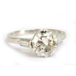 A platinum and diamond solitaire ring, the brilliant cut stone weighing approx 2cts, in ten claw