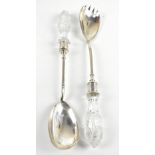 HORACE WOODWARD & CO; a pair of Victorian hallmarked silver salad servers with cut glass handles,