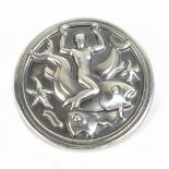 GEORG JENSEN; a silver merman on whale circular brooch designed by Arno Malinowski, co.285 and