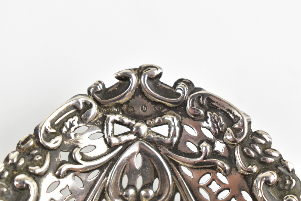 GEORGE UNITE; a Victorian hallmarked silver caddy spoon with foliate finial and bright cut detail to - Image 4 of 20