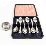 WILLIAM TUCKER & CO; a cased set of six George VI hallmarked silver teaspoons, Sheffield 1944, and a