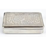 An Austrian silver snuff box of rectangular form, with engine turned and relief decorated cover,