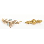 A 15ct yellow gold filigree decorated bar brooch, length 4.2cm, approx 3.1g, and a 9ct yellow gold