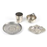 Four pieces of Continental white metal including a saucer dish, diameter 13cm, an embossed pin
