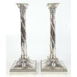 WALKER & HALL; a good and large pair of late Victorian hallmarked silver loaded candlesticks, each