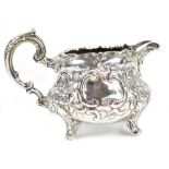 SAMUEL SMILY (GOLDSMITHS ALLIANCE LTD); a Victorian hallmarked silver cream jug, with scrolling
