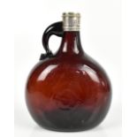 A Victorian amber glass brandy jug with hallmarked silver collar with cast beaded rim, maker's marks