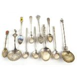 A collection of silver and white metal spoons including three Russian examples, each with chased