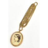 A 9ct yellow gold oval pendant centered with the printed portrait of a young woman and with glass