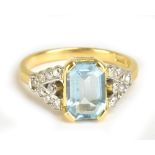 An 18ct yellow gold aquamarine and diamond ring, size K, approx 3.9g.Additional InformationThe