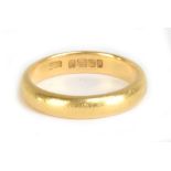 A 22ct yellow gold plain wedding band, size L 1/2, approx 5.7g.Additional InformationHeavily