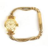 CYMA; an 18ct yellow gold cased lady's wristwatch, the dial set with baton numerals, diameter