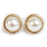 A pair of 14ct yellow Mabé pearl ear clips, diameter approx 2cm, approx 13.2g.Additional