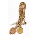 A 9ct yellow gold double Albert curb link pocket watch chain, with T-bar suspending a 9ct fob medal,