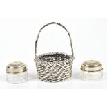 Two German 800 grade silver tot dressing table pots, and a hallmarked silver and white metal basket,