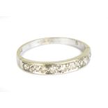 A 9ct white gold and diamond set half eternity ring, size M, approx 1.7g.Additional InformationThe