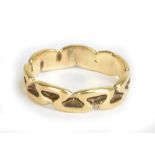 A 9ct yellow gold shaped wedding band, size R 1/2, approx 3.4g.Additional InformationSome general