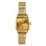 OMEGA; a vintage 18ct and 9ct yellow gold lady's wristwatch with simple dial and seventeen jewel