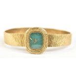 BULOVA; a lady's vintage 14ct yellow gold wristwatch, the turquoise coloured dial set with Roman