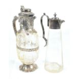 GOLDSMITHS & SILVERSMITH CO; an Edward VII hallmarked silver mounted claret jug, with cut glass