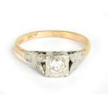 An 18ct yellow gold diamond solitaire ring, the diamond weighing approx 0.20cts and an illusion