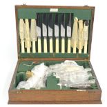 A group of silver plated items including an electroplated cased canteen of cutlery, a pair of