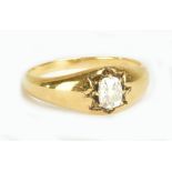 A yellow metal and diamond solitaire ring, the oval cut stone in eight claw setting, ring size R 1/