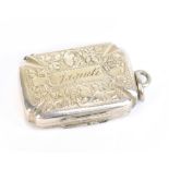 WILLIAM LEA & CO; a George III hallmarked silver vinaigrette of shaped rectangular form, with chased