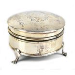 A & ZIMMERMAN; a George V hallmarked silver circular lidded trinket box with ribbon tied bow and