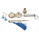 A silver propelling pencil, a decorative thimble, a pair of modern earrings, a pocket knife and a
