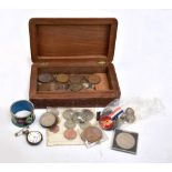 A mixed lot of assorted coinage including cartwheel penny, dated 1797, crown, dated 1935, etc, and a