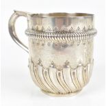 EDWARD BARNARD & SONS LTD; a late Victorian hallmarked silver mug, decorated in relief with a ring