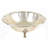 A Norwegian 830 grade silver bowl with panelled outer detail, raised on three outswept supports,