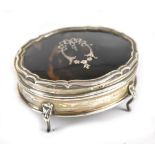 EDWARD SOUTER BARNSLEY; a George V hallmarked silver and inlaid tortoiseshell trinket box of oval