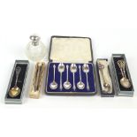 A small group of hallmarked silver items including a set of George V cased apostle spoons, Sheffield