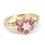 A 9ct yellow gold ruby and diamond floral dress ring, size P, approx 2.3g.Additional