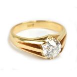 An 18ct yellow gold and diamond solitaire ring, the round brilliant cut stone weighing approx 1.